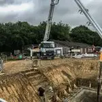 Schwing 28m pouring a reinforced Concrete basement slab in Mayfield East, Sussex